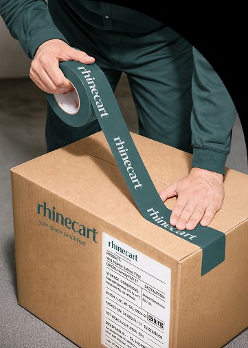 A RhineCart branded box being sealed for shipping